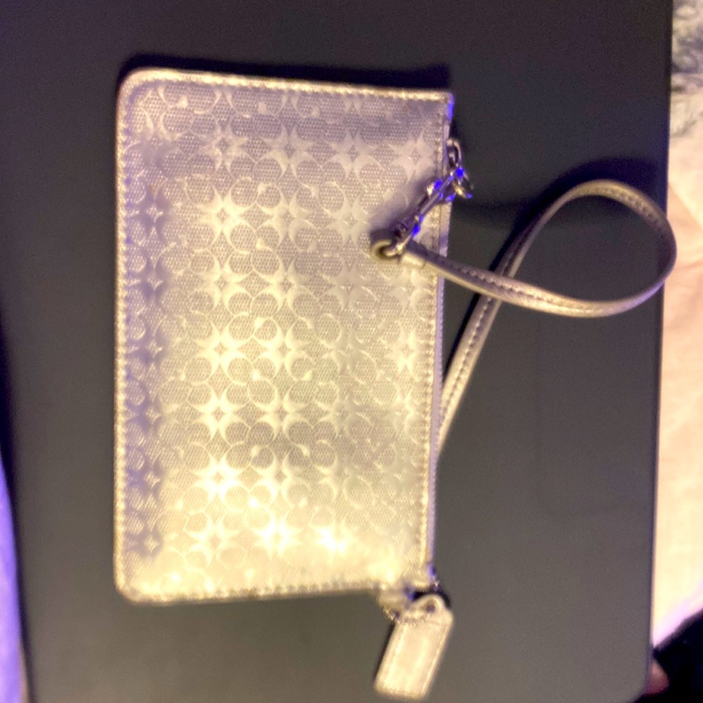 Coach Wristlet new without tags. Almost vintage